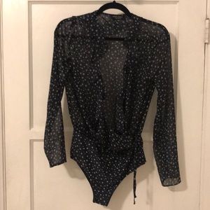 Sheer star wrap top in navy blue.